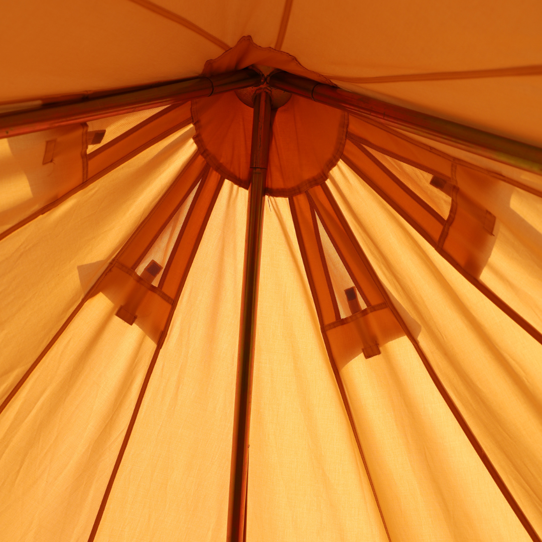 The Bedouin bell tent wooden hub and spokes at the canvas peak