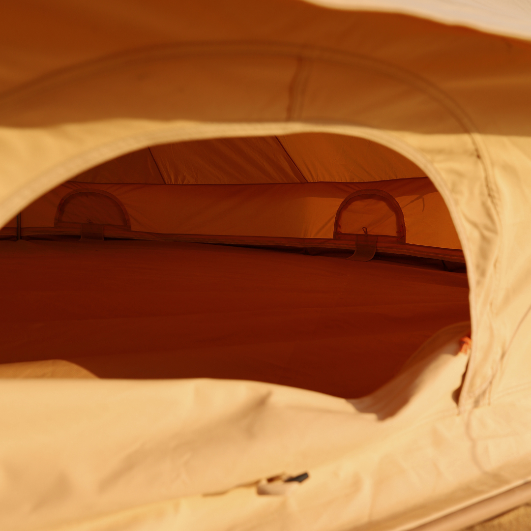 Inside the Bedouin bell tent, showing the inner canopy and sleeping area
