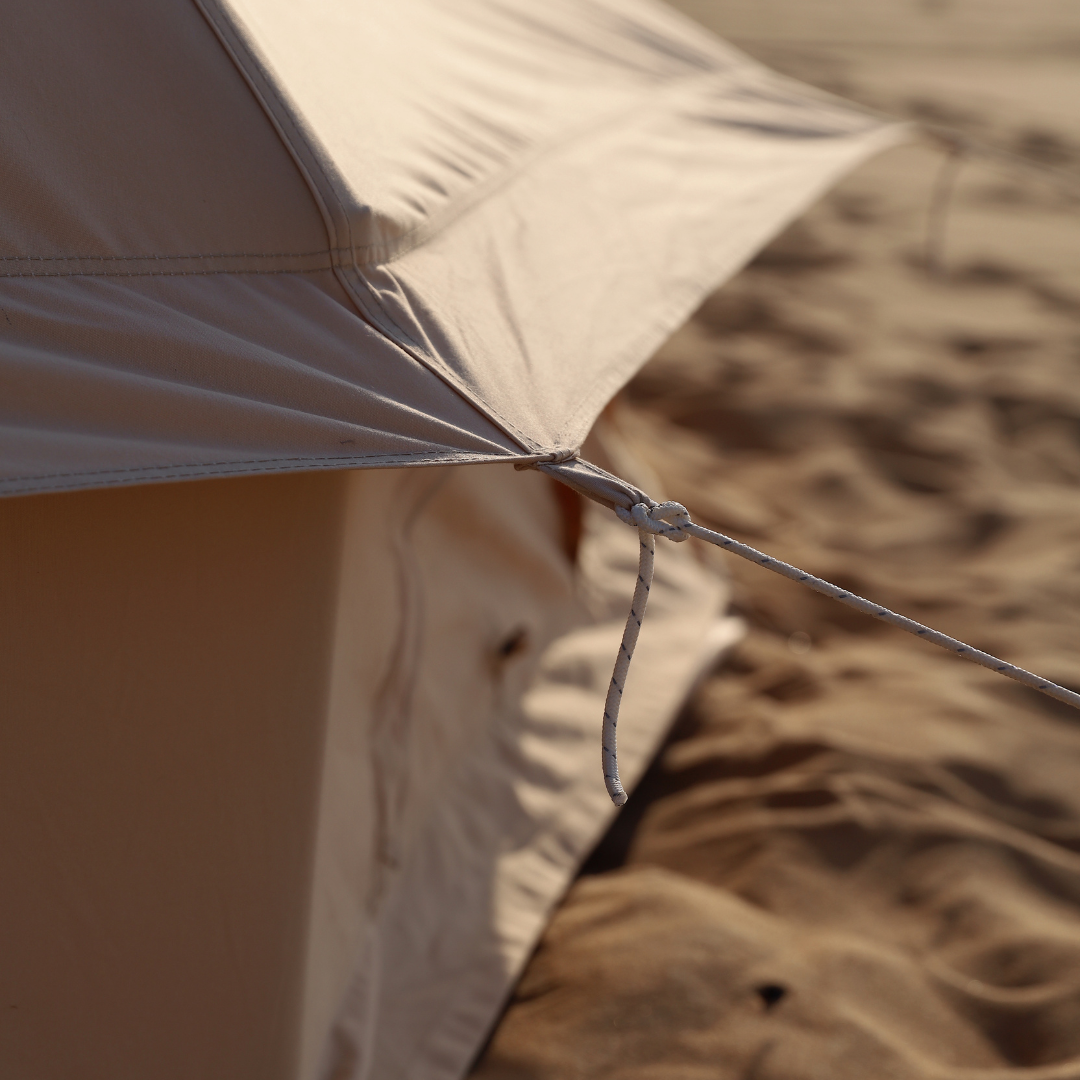 Close view of the Bedouin bell tent canvas seam and guy rope fixing