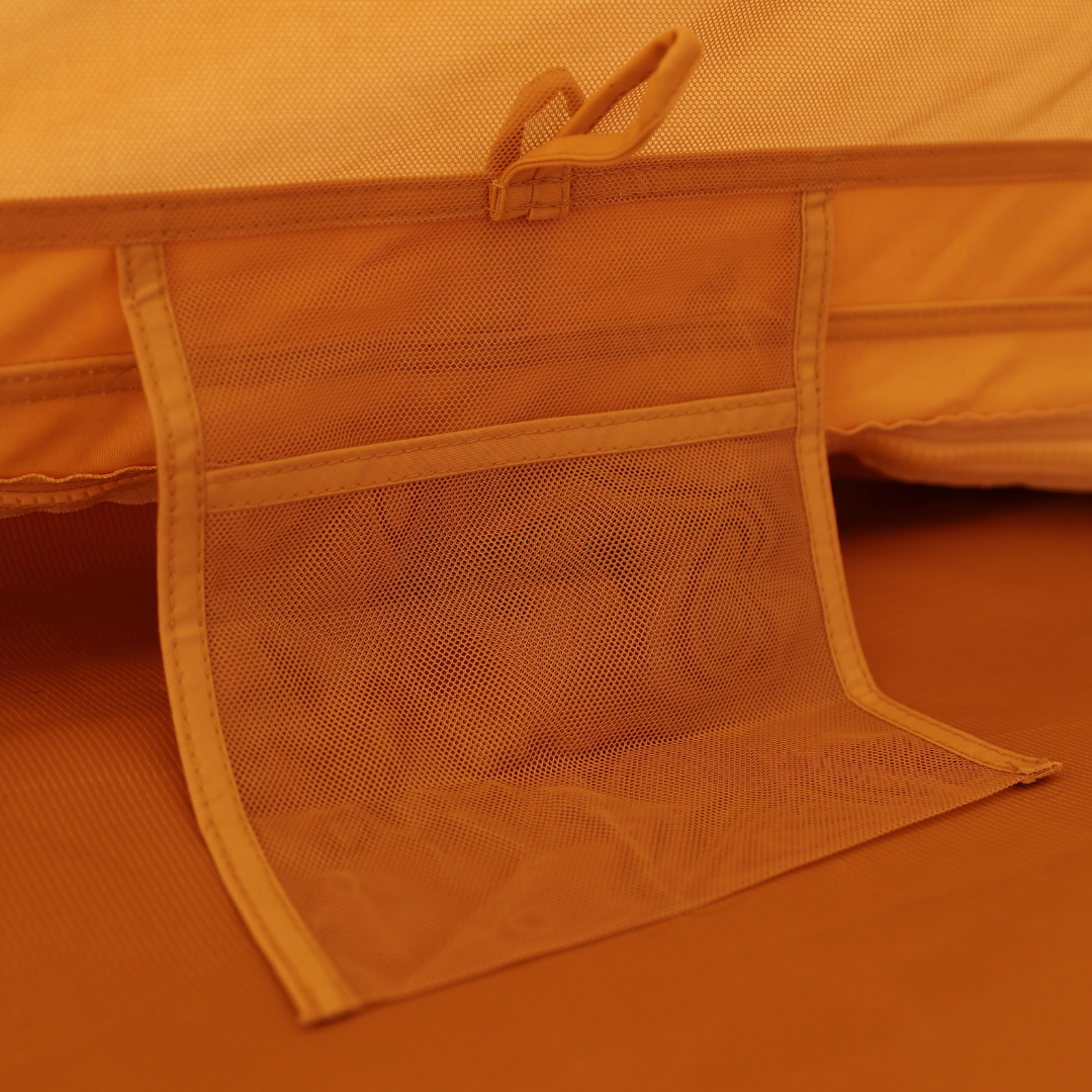 Mesh storage pocket inside the Bedouin bell tent above the groundsheet